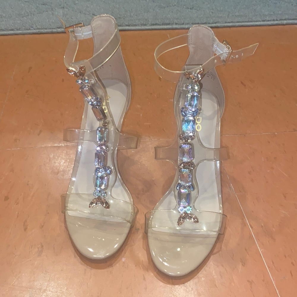 Bedazzled and jeweled heels worn one time.